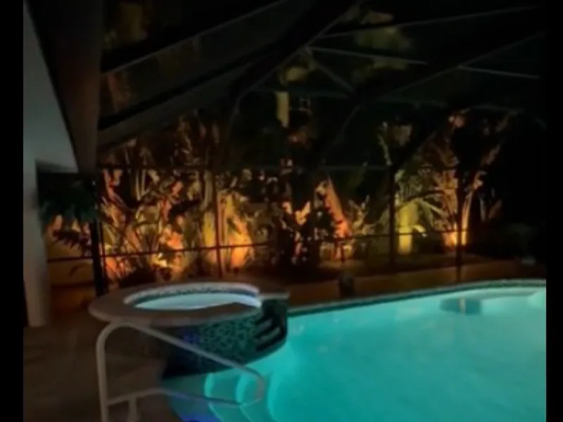 Color-changing pool and architectural accent lighting at night
