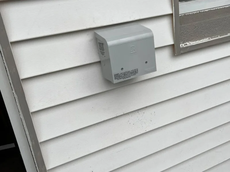 Generator power inlet box installed on a Pinellas County home