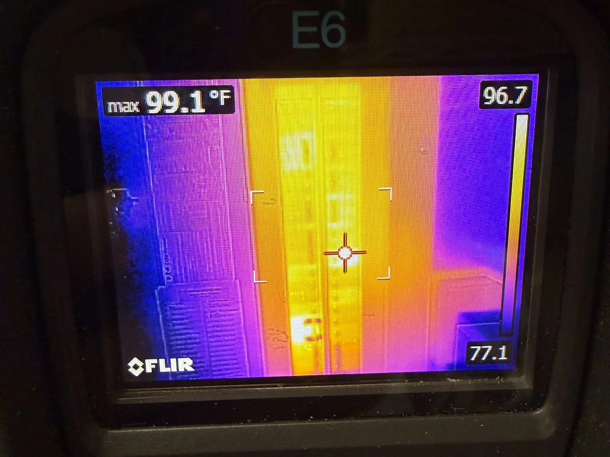 Thermal camera scan of an electrical panel showing a maximum of 99.1 degrees Fahrenheit